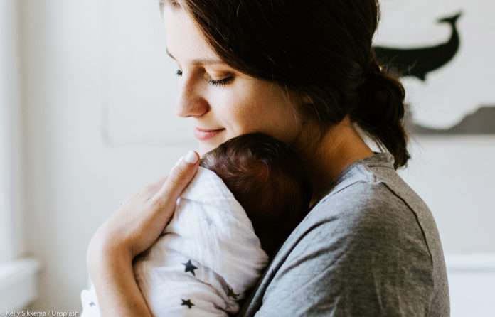 how to hold your newborn